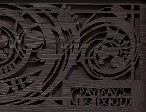Art nouveau carved wood panel with the words Gray Days and Gold